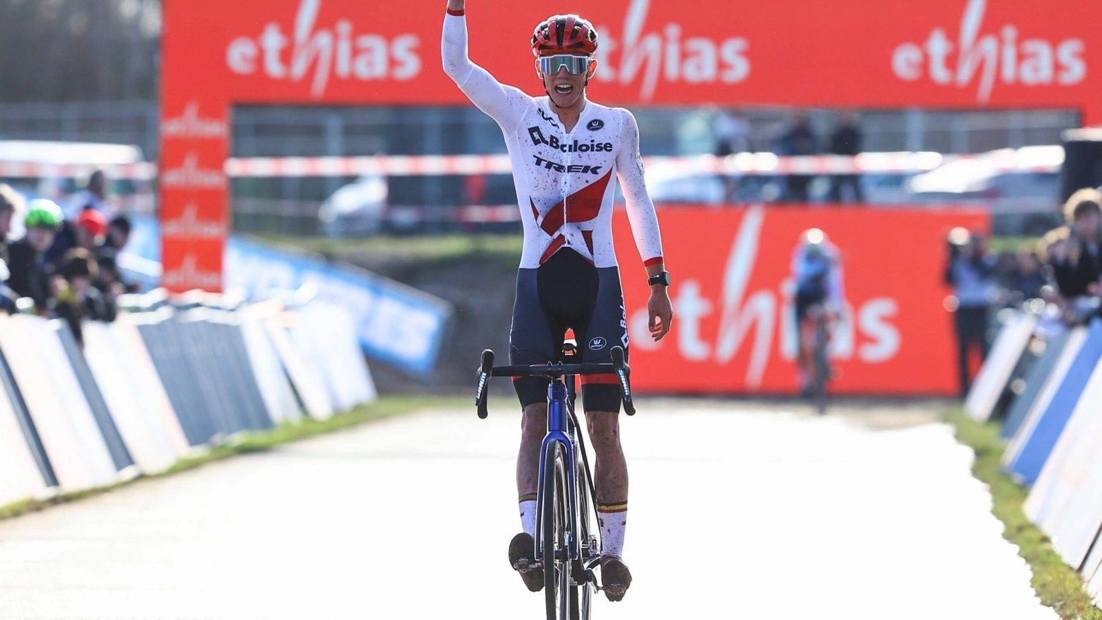 Belgian Thibau Nys celebrates as he crosses the finish line to win the men's U23 race at the World Cup cyclocross cycling event in Zonhoven on Sunday 08 January 2023, stage 12 (out of 14) of the UCI World Cup competition. BELGA PHOTO DAVID PINTENS